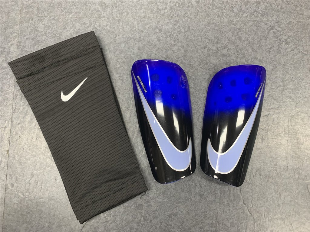 Caneleira Com o Porta Caneleira Nike